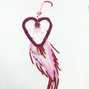 Espantasueños Heart-Shaped Beaded Dreamcatcher with Pink and Red Tassels for Home Decor
