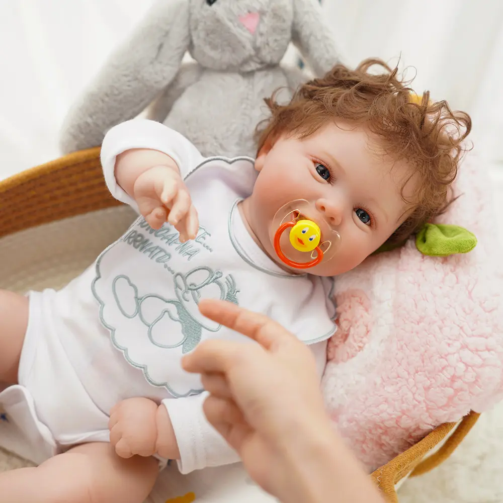 VACOS 22inch Reborn Baby Doll: Soft vinyl body with delicate curls, charming outfit featuring embroidered details, lifelike clear eyes, and soft fabric folds for natural posing. Perfect for birthdays, holidays, or a tender keepsake gift!