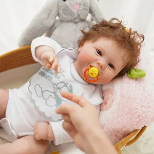 VACOS 22inch Reborn Baby Doll: Soft vinyl body with delicate curls, charming outfit featuring embroidered details, lifelike clear eyes, and soft fabric folds for natural posing. Perfect for birthdays, holidays, or a tender keepsake gift!