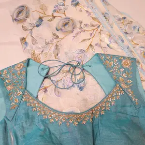 White and Blue Brasso Saree with Rawsilk Maggamwork Blouse