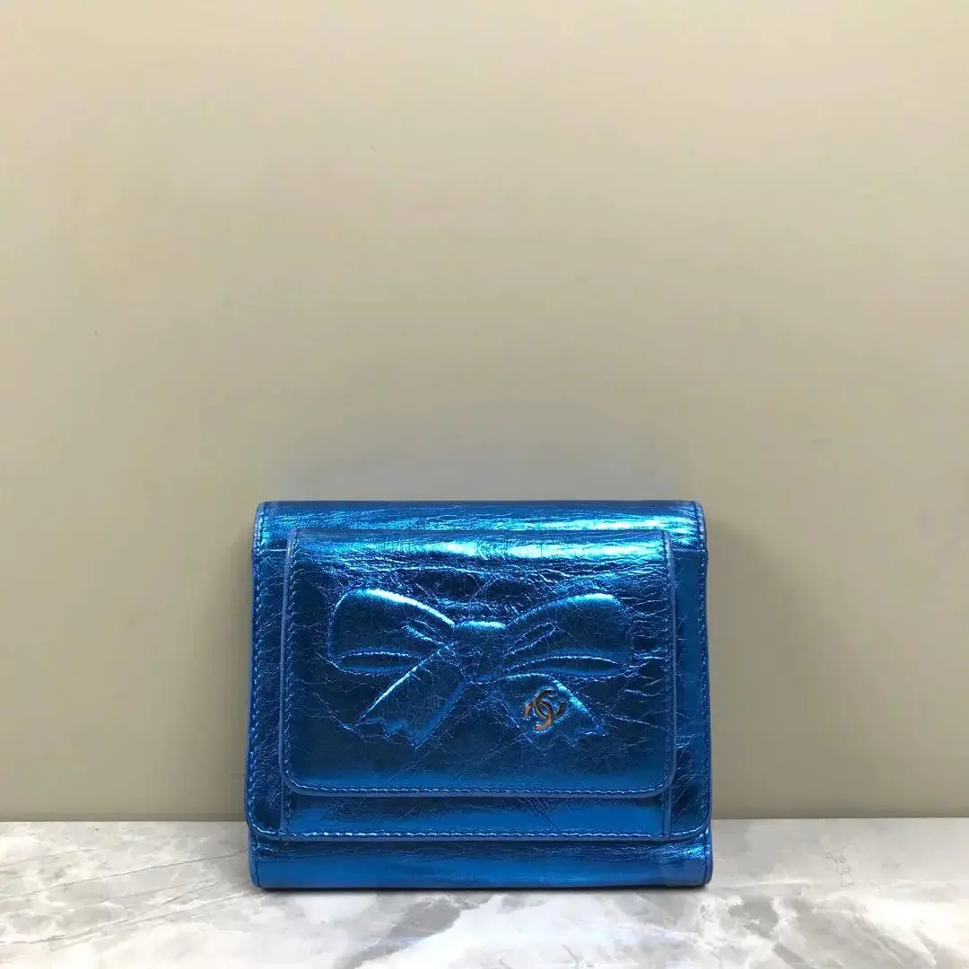 Pre-owned Chanel 2008 2009 Metallic Blue Crinkled Calfskin CC Bow Trifold Wallet SC177