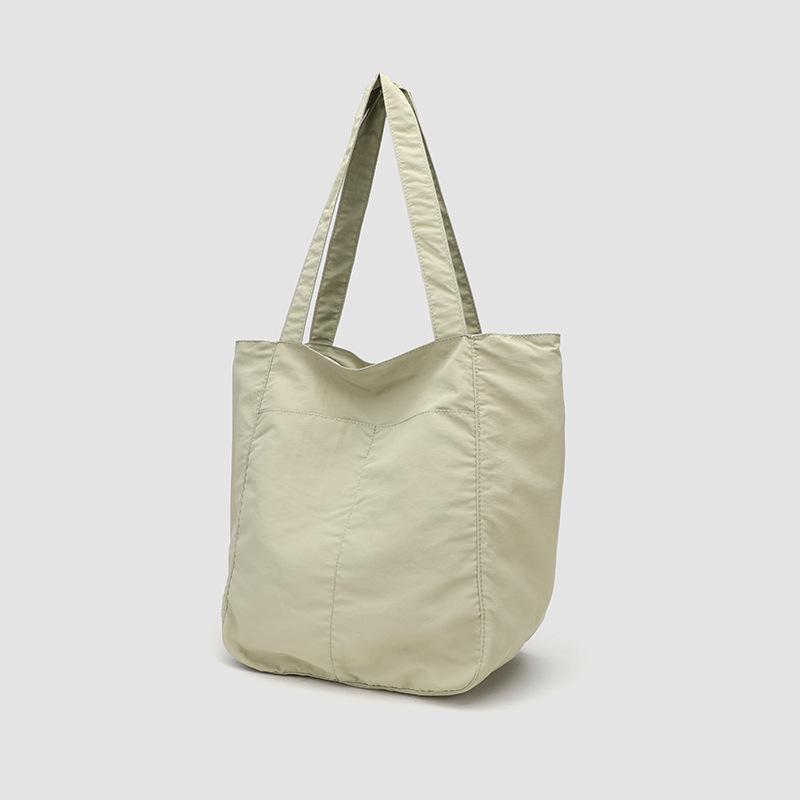 Minimalist Large-Capacity Canvas Tote Bag Versatile Shoulder Handbag for Commuting and Students Waterproof Nylon Casual Women's Bag