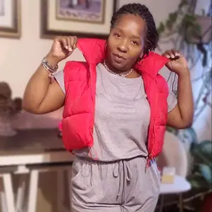 PUFFIT Women's Oversized Puffer Gilet with Deep Pockets and Adjustable Toggles - Sleeveless Quilted Vest for Underwear and Tops puffer vest