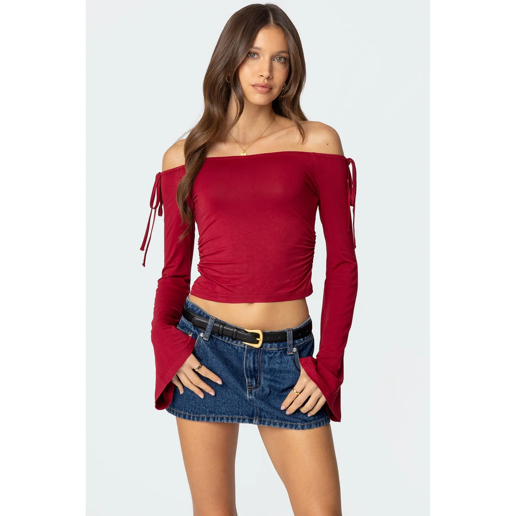 One off the shoulder top with ribbon down the side ahein - TikTok Shop
