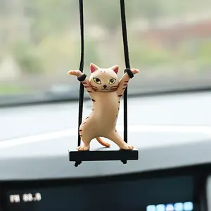 A charming car pendant featuring a cute dancing cat—a creative interior rearview mirror decoration.