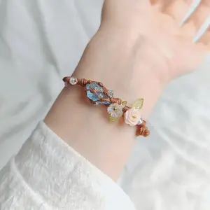 Natural ocean blue baby stone and hand-woven synthetic fiber rope raw stone bracelet in a mesh pouch, a gift for a best friend