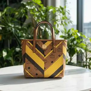 Pre-owned MCM canvas and leather Tote Bags Studded Toni Top Zip Shopper in Mega Herringbone Visetos New