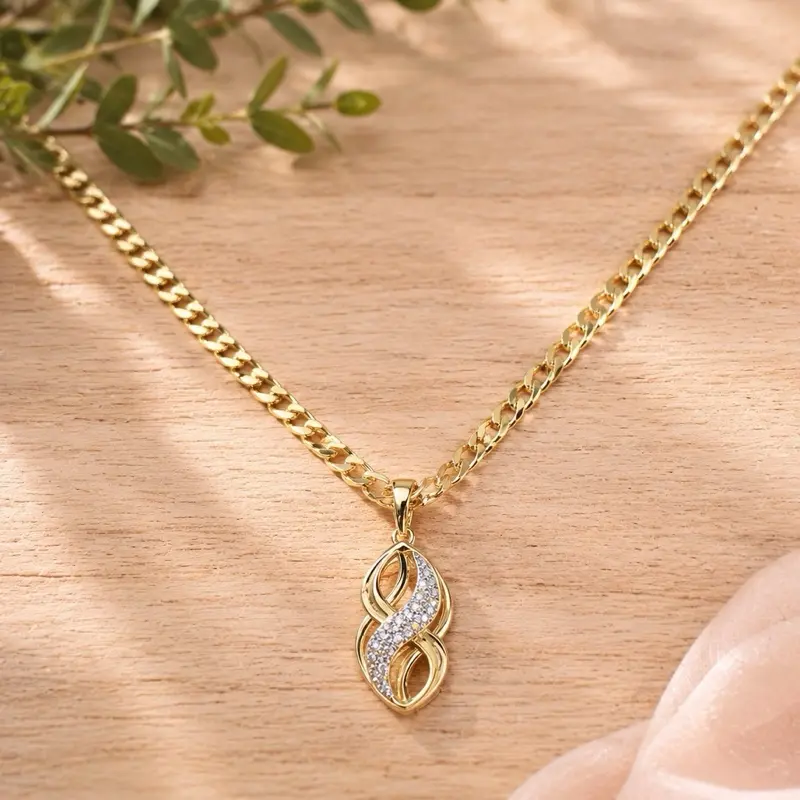 Chain with infinity pendant. Laminate 14k long 20 inches.