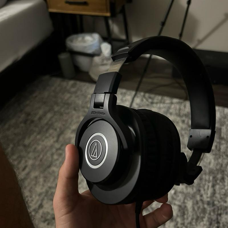 Audio-Technica ATH-M50x Professional Studio Monitor Headphones with 45mm Drivers, Circumaural Design, and Detachable Cable for Enhanced Sound Isolation and Durability