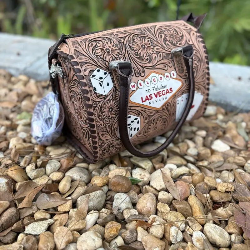 Medium size Welcome to Las Vegas flower blossom tooled leather speedy purse. 12x8x9”