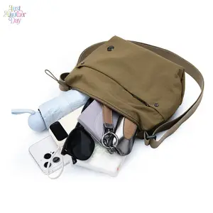 Lightweight Nylon Crossbody Bag | Minimalist Sling Bag for Women | Waterproof & Durable | Multi-Pocket Design | Versatile Wear Styles | Perfect for Daily Commute, Travel & Casual Outings | Spacious Enough for Phone, Keys & Cosmetics | Trendy Neutral Color