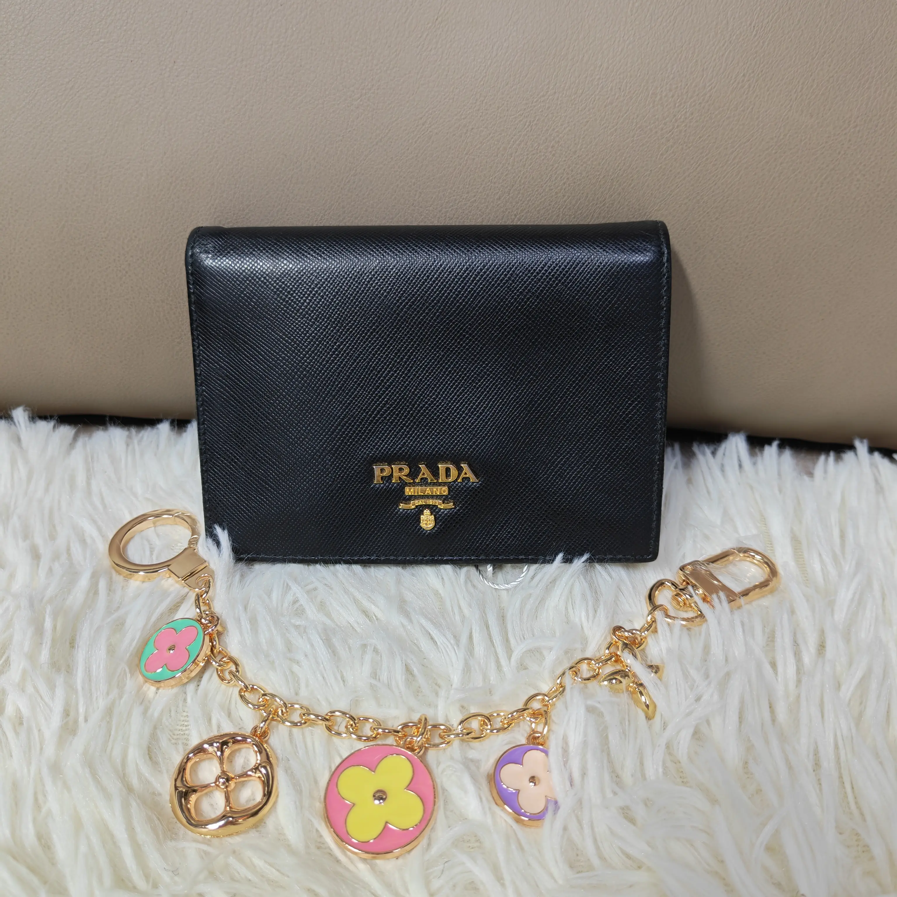 Pre-owned PRADA Black and Gold Bi Fold Compact Wallet (SZ 02785)