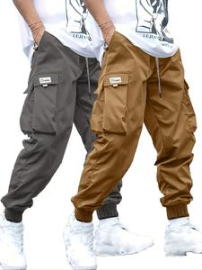 men's plus size solid color patched drawstring cargo pants, trendy casual fashion elastic waist flap pocket trousers for daily wear, streetwear men's plus bottoms for all seasons, men's cargo work pants, cargo pants men, sports clothes
