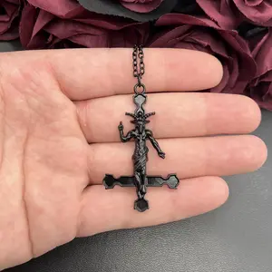 Make Your Darkest Statement! This inverted cross and Baphomet necklace is the boldest piece in your alternative jewelry collection.