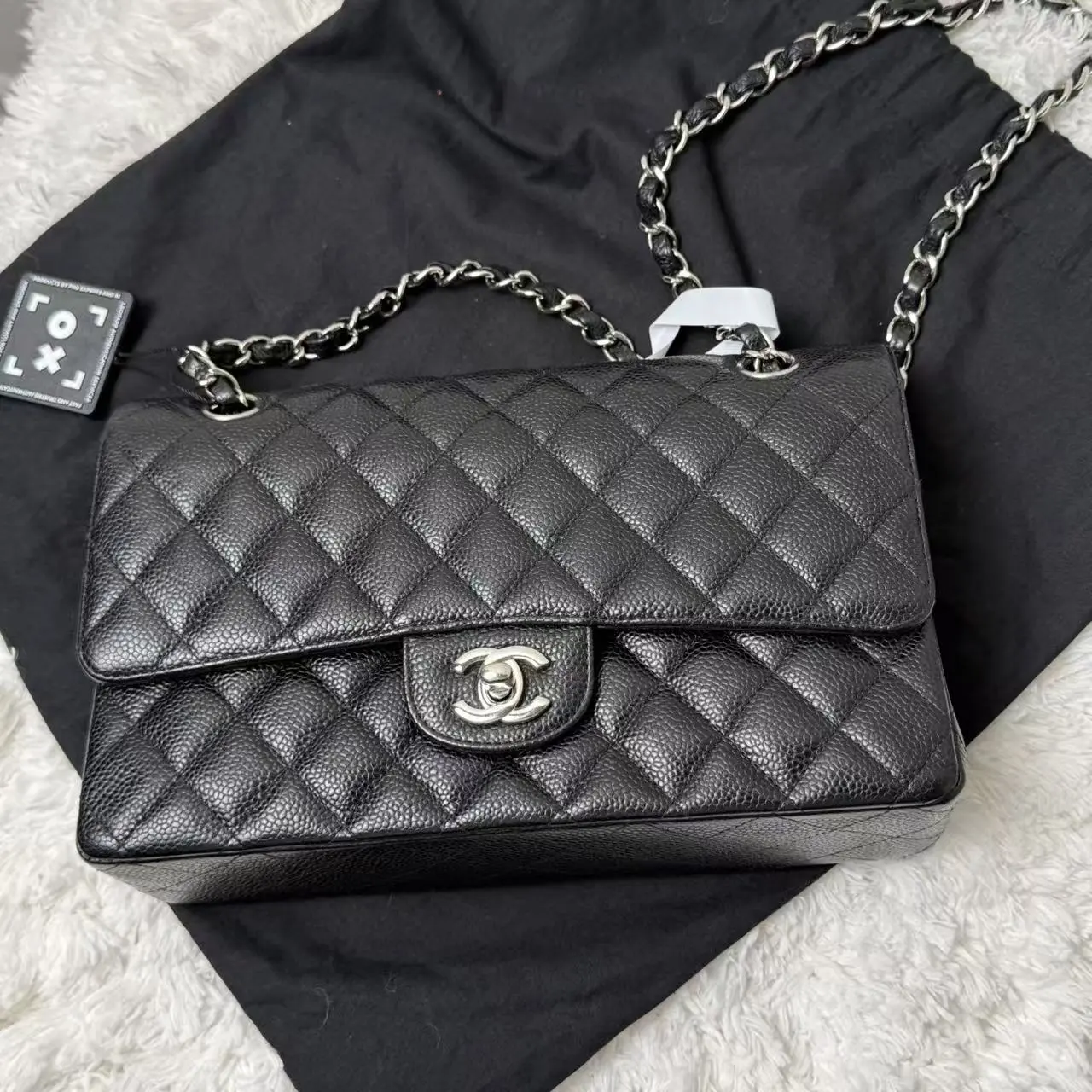 Pre-owned CHANEL Caviar Shoulder Bags Classic Flap bag in black quilted leather with silver hardware
