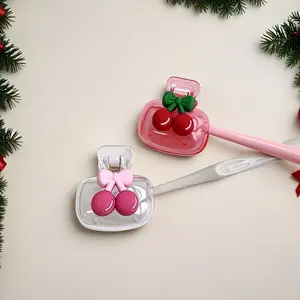 1PC Cherry Design Toothbrush Holder, featuring cute cherry patterns and a compact and portable design that is easy to carry. It protects the toothbrush head and has a double-hole design for better drainage and ventilation. Perfect for home or travel use.
