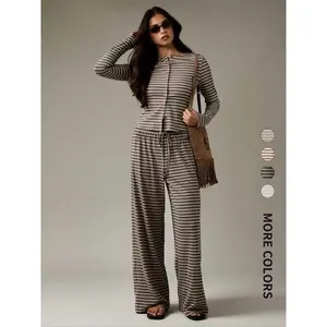 Women’s two-piece set featuring wide-leg pants and a long-sleeved striped knit suit, with a casual knitted cardigan for spring and autumn—comfortable and fashionable.