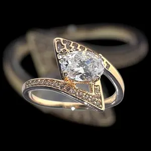 Anello de Oro Laminated and Embroidered with Stones Ado Gold Ring with Central Stone and Diamond Accents