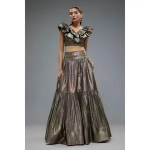 Gold ruffle blouse with lehenga