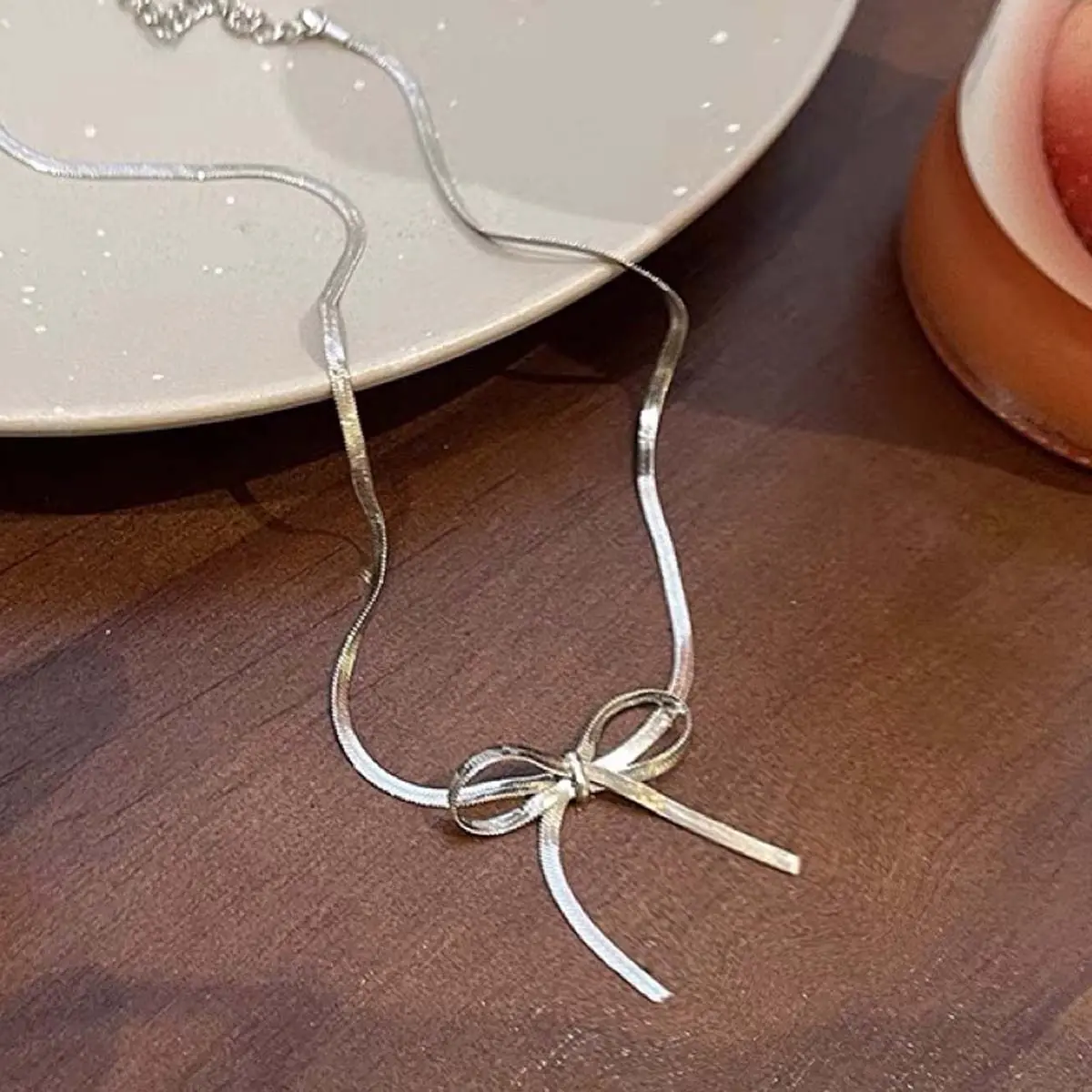 Silver snake bone chain bow necklace girls daily jewelry gift Silver snake bone chain bow necklace girls daily jewelry gift