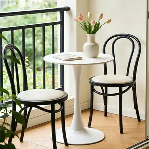 A light luxury style white round dining table with an elegant tulip-shaped steel base and a 24-inch medium-density fiberboard tabletop in a modern medieval style.Suitable for kitchens, dining rooms a