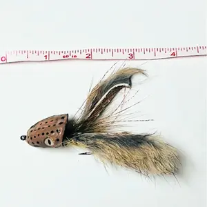 Custom Hand tied and hand painted double barrel surface slider. Dry Fly