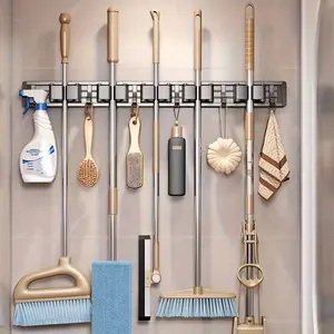 Heavy-duty metal mop and broom rack with four slots and five hooks, adjustable hooks, bathroom storage organizer, space-saving storage solution for mops and brooms, suitable for home, kitchen, garden, laundry, RV, garage, wall-mounted storage for mops, br