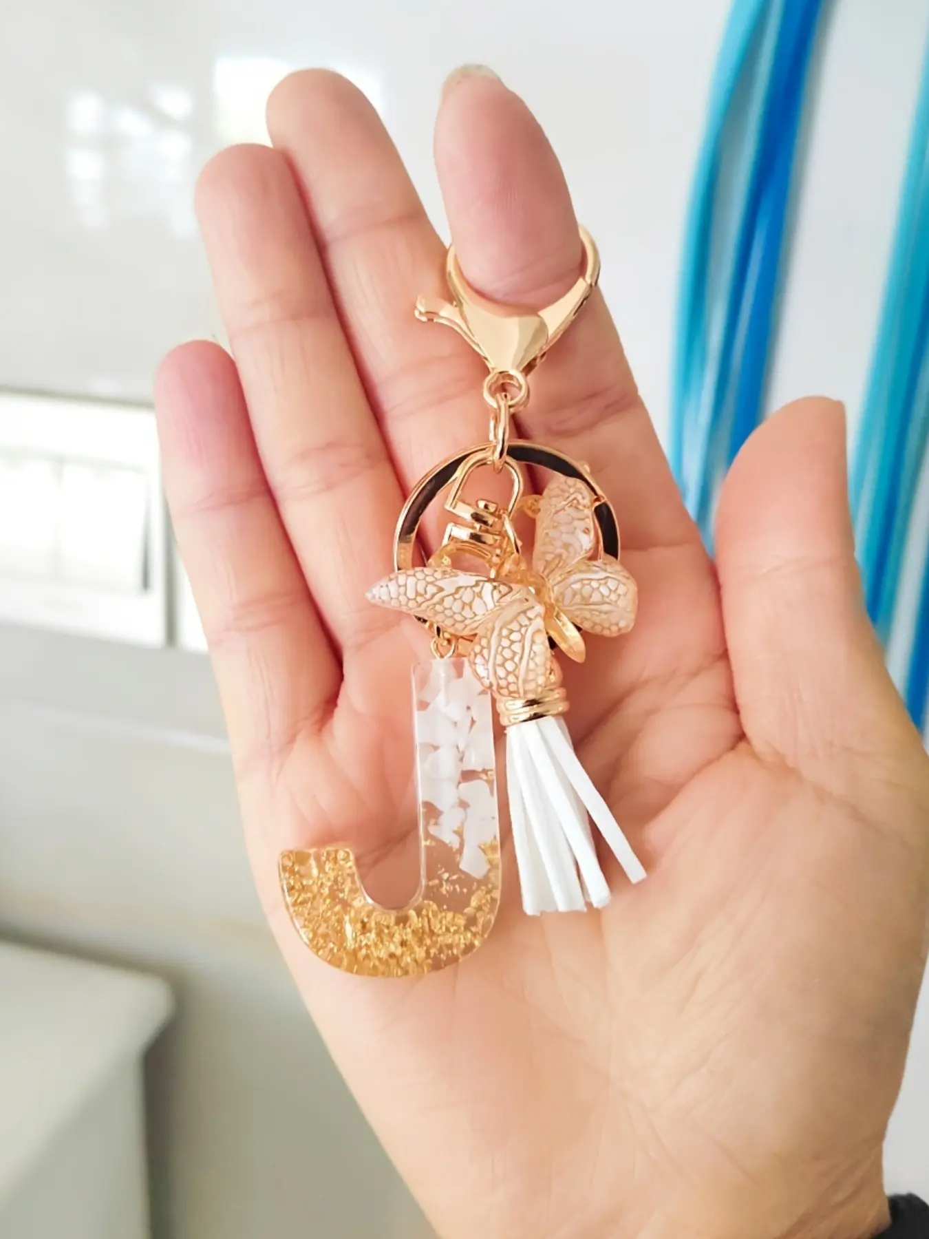 1pc Chic Alphabet & Butterfly Resin Keychain with Tassel - Golden-Tone, Glittery Letter A Design, Friendship & Love Themed, Rectangular Shape for Autumn/Winter Fashion Accessory Stylish Keychain