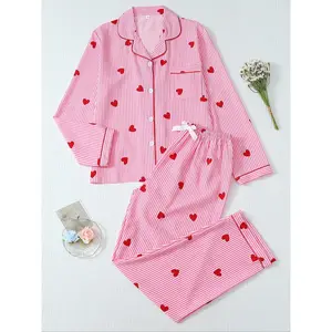 Women’s pajama set, sweet casual loungewear, long-sleeved top with bow detail, pocketed design, elegant striped heart-shaped print, pajamasGARMENTARY