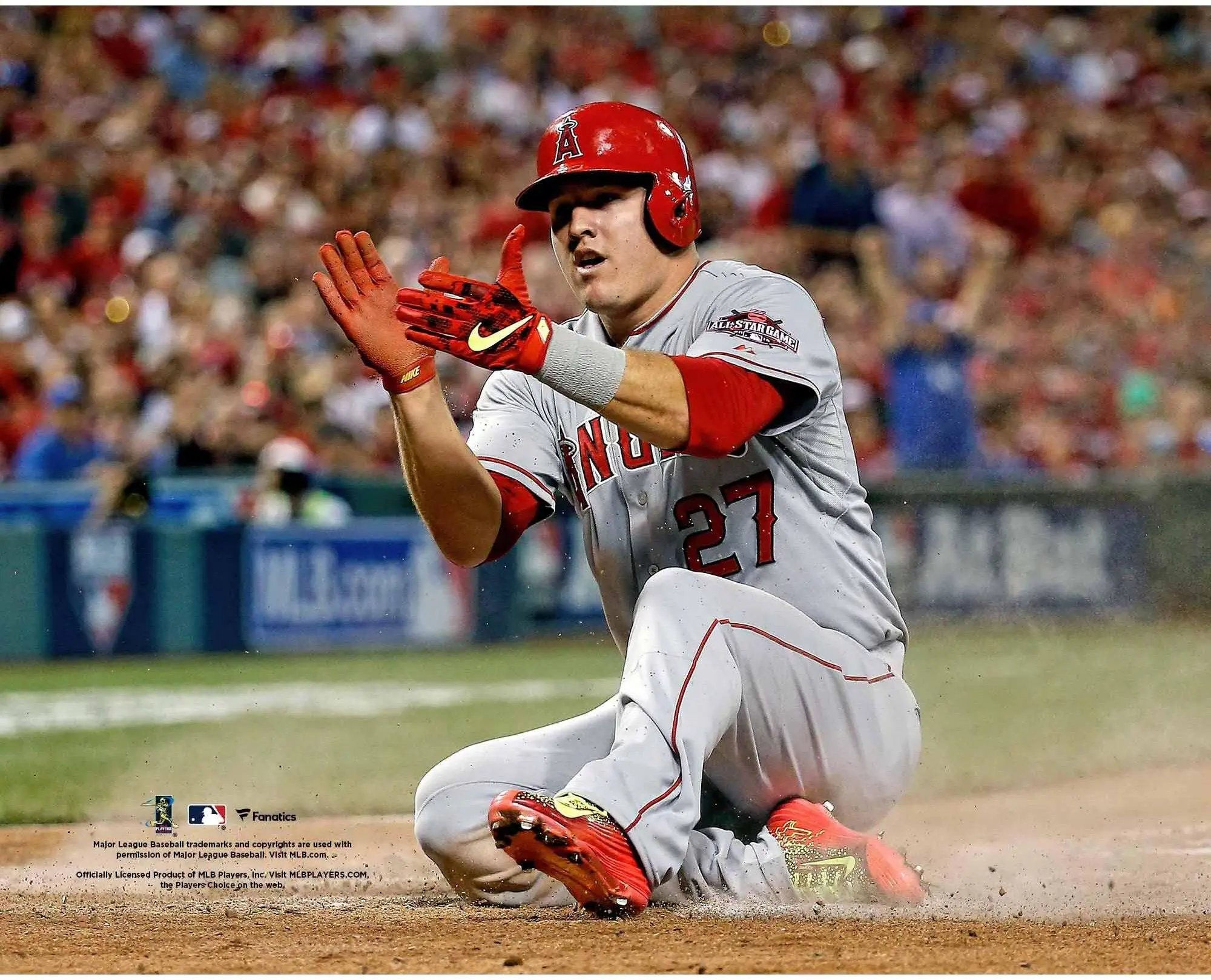Mike Trout Los Angeles Angels Unsigned Scoring Celebration Photograph - MLB Memorabilia