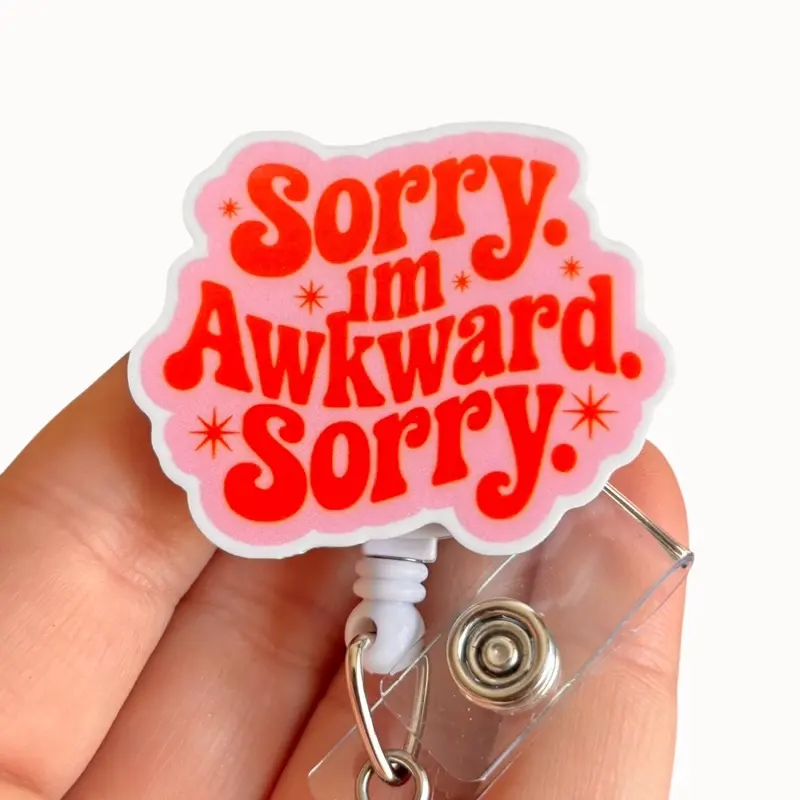 Glitter My Badge Sorry I’m awkward badge reel for nurse and hospital workers. Badge clip Badge pull - Retractable swivel clip with a 360 rotation. Great gift for coworkers. Funny badge reel