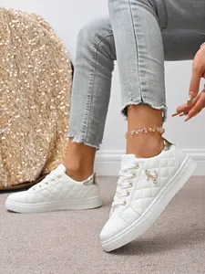 Chic White Quilted Sneakers for Women, Gold Anchor Emblem Lace-Up Flats, Trendy Casual Trainers for Street Style