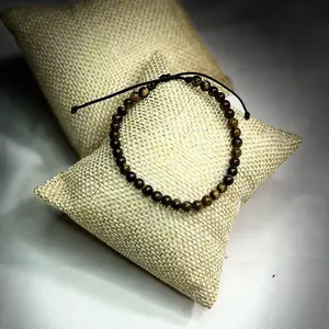 Pulsera en hilo con piedra ojo de tigre, cuarzo amarillo