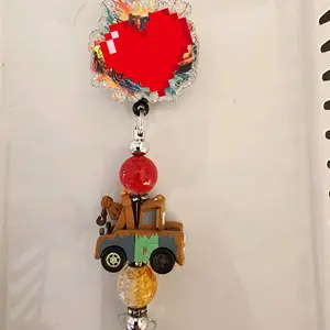 Acrylic badge reel with beaded bar and character.