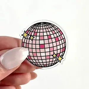 Pink Disco Ball Acrylic Pin - Pink Background with Star Design and Black Grid Pattern