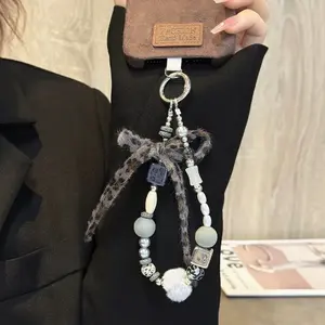 [Lianwang] Autumn and winter advanced sense flocking brown beaded hand chain wrist short lanyard mobile phone case car keychain bag pendant Diy