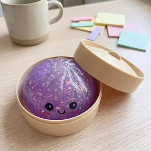 Portable Glitter Dumpling Stress Release Hand Toy with Mini Steamer Box, Soft Elastic Tactile Toy for Calming Mood, Tiny Table Decoration for Teens & Adults
