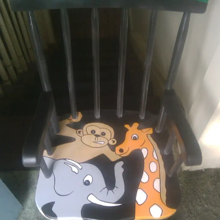 Custom hand painted toddlers Rocking chair with zoo animals and personalized name on back-rest.
