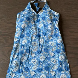 Cotton Fabrics Short Sleeveless Kurtha in Blue Floral Print for Apparel Use