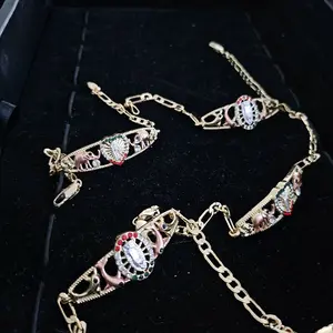 Virgen de Guadalupe With Figaro Bracelet - Gold-Toned Chain Design Featuring Decorative Elements