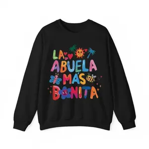 A sweatshirt with La Abuela Más Bonita lettering decorated with sun palm trees butterflies and bees, showing love for grandma