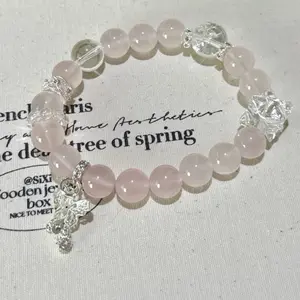 Rose Quartz Bowknot Love Charm Bracelet with Sparkling Beads and Elegant Bow Design