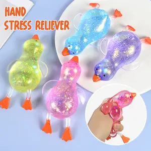 Squeeze Glitter Random Colors Duck Stress Relief Toy Mini Stretchy Soft TPR Fidget Toy with Sparkling Design for Anxiety Relief & Sensory Stimulation 7cm L x 13cm W