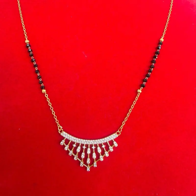 Gold plated daily use Nepali  Mangalsutra with black potey and multiple stone work on it.