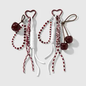 1 piece — sweet, stylish, versatile, cute, high-appeal handmade beaded keychain/bag charm featuring a bow, simulated cherries and apples, woven cord; suitable for sisters and best friends’ everyday wear; ideal as a holiday gift.