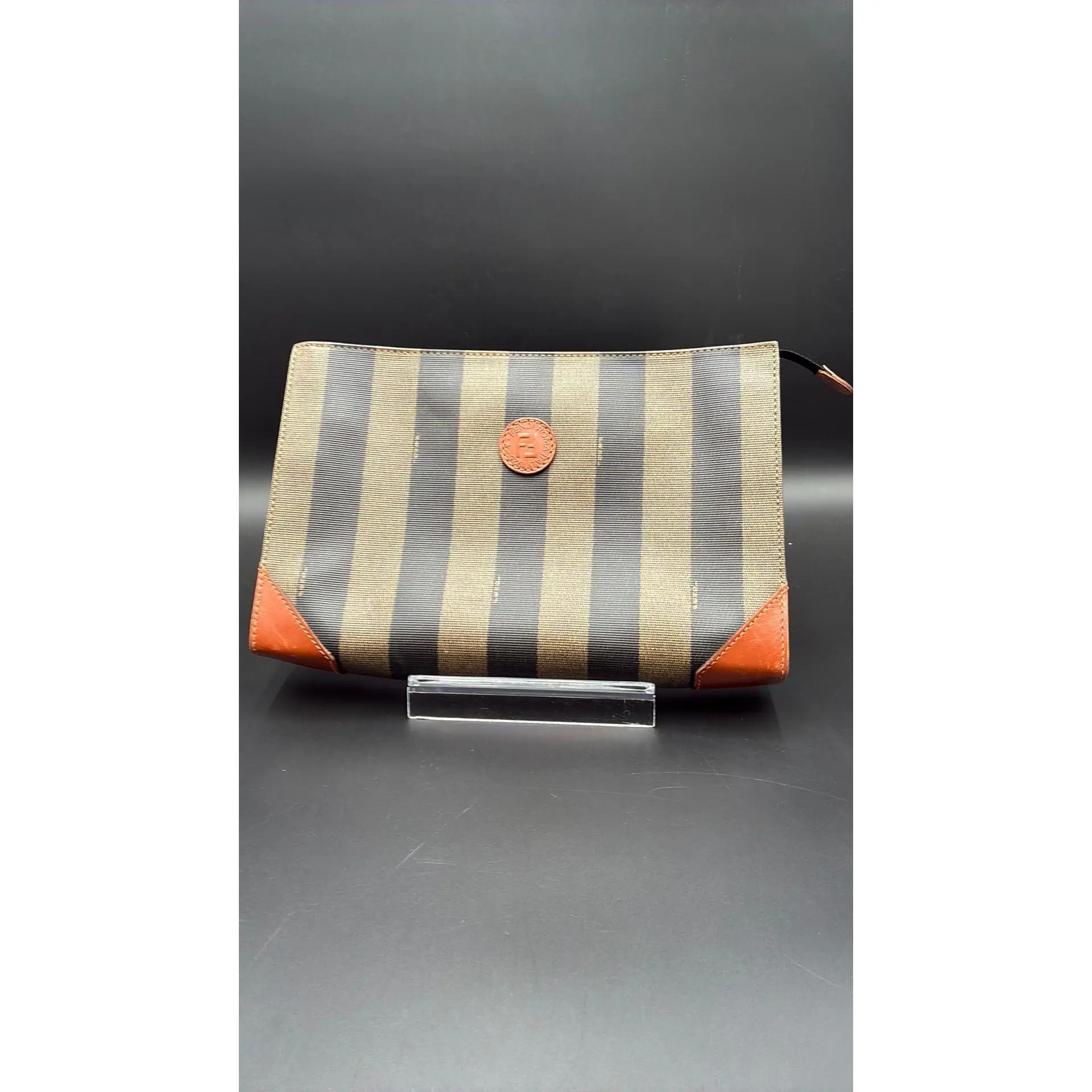 Pre-owned Leather Luxury Bags & Accessories Fendi Pequin Stripe Clutch Bag Date Code: A13023. Entrupy ID: 69X9RJH.