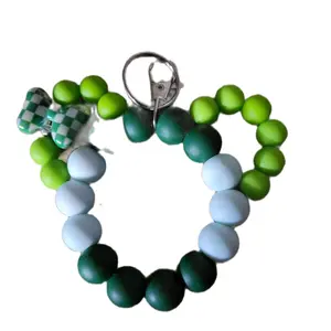 Green Mouse Ears Keychain with Green White and Black Beads and Checkerboard Bone Charm