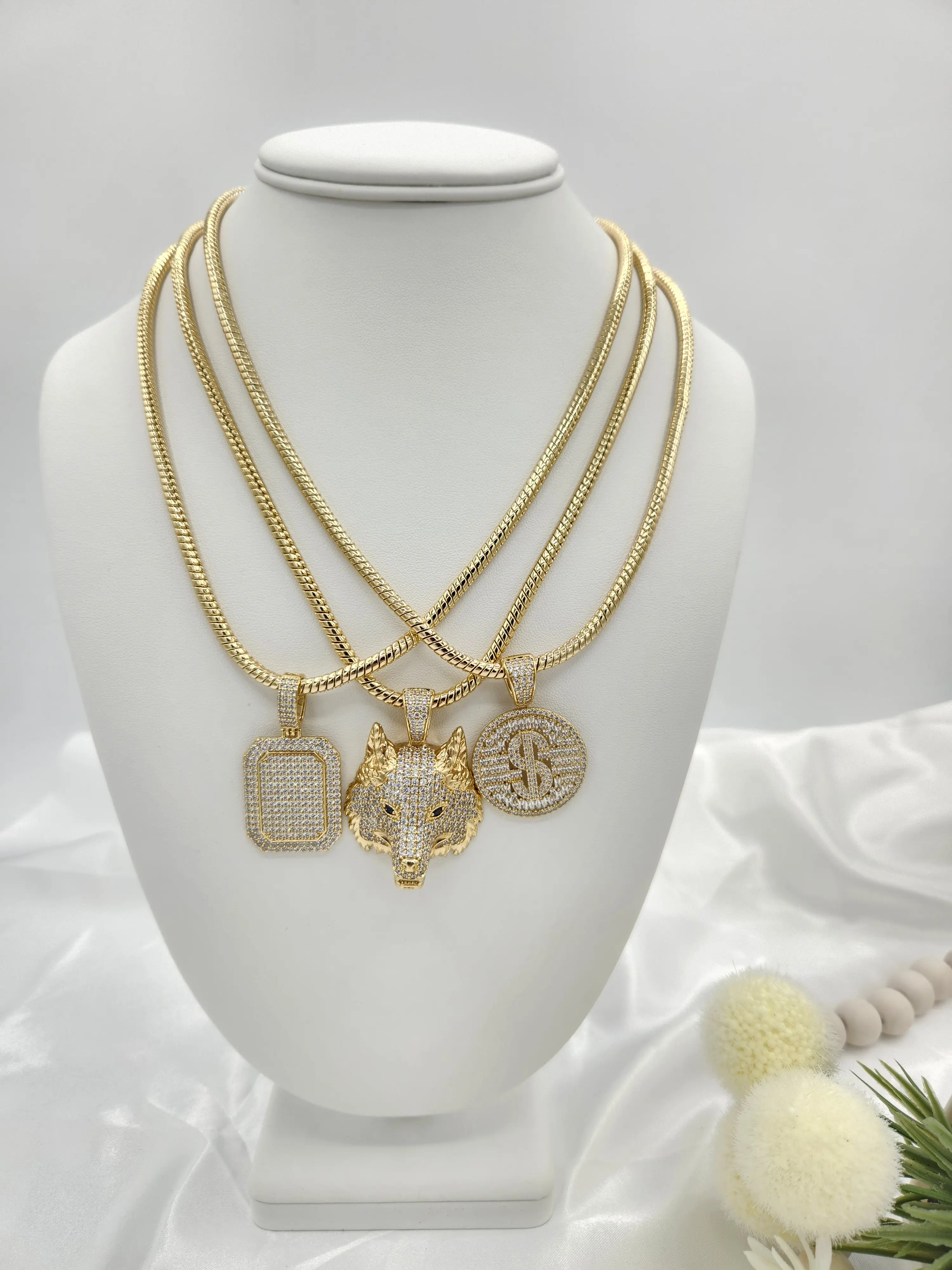 mens chains with high-impact , shiny 14k gold plated charms.