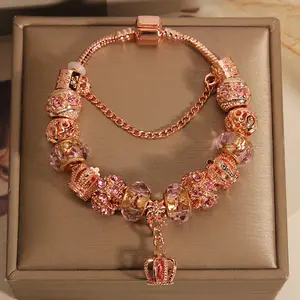Rose Gold Crown Charm Bracelet – Regal Elegance