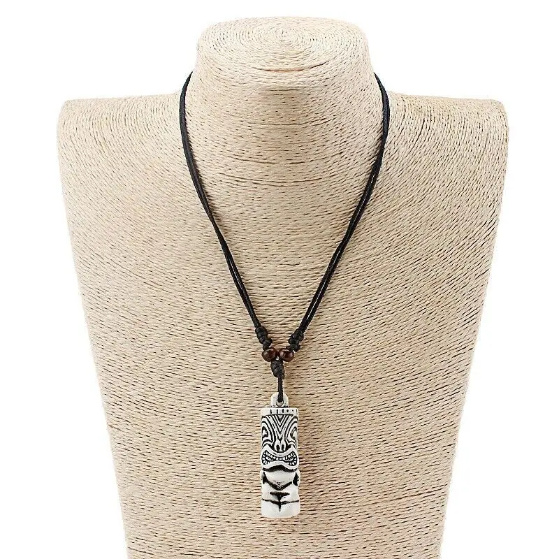 Official Limited addition TikiLimo Tiki Necklace! Hand Carved Maori Tiki Man Pendant with cord!  Transform yourself on to the TikiLimo by wearing this necklace worn by over 1000 of the Tikilimo's party tribe!